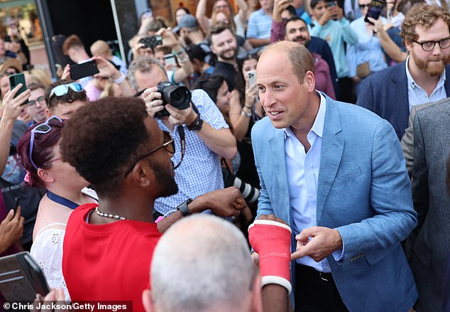 The Prince of Wales meets members of the public outside Pret in Bournemouth on Thursday