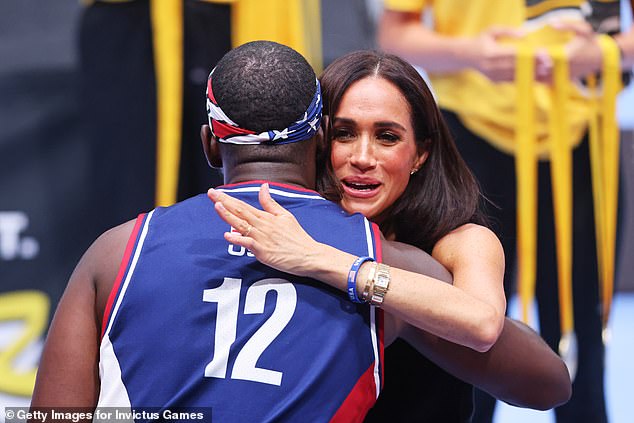 The Duchess hugged one of the stars of the tournament on Wednesday