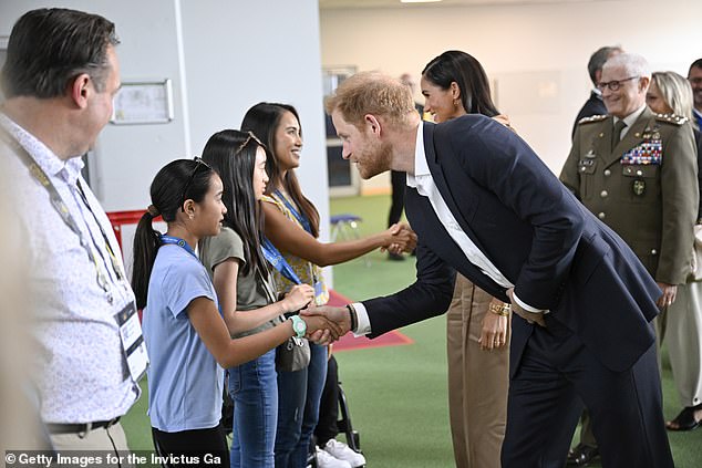 Harry met families of NATO military personnel from Italy and the Netherlands at the gathering