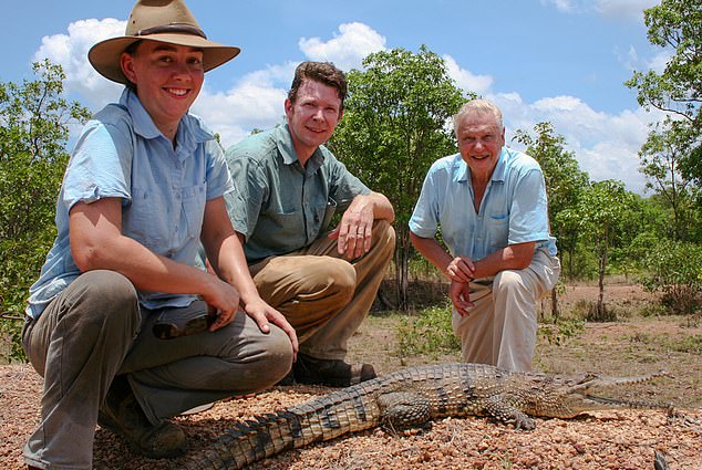 Adam Britton (centre) with his wife Erin (left) and David Attenborough (right) during filming for a BBC documentary Cold Blood. Britton hid the abuse from his wife for years