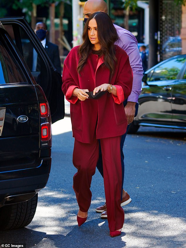 Despite the event being held at a public school where the majority of students  have low income backgrounds, Meghan arrived at the September 24, 2021 event wearing a $5,840 Loro Piana cashmere coat and matching $1,680 pants