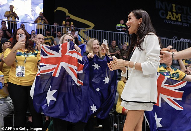 The Duchess of Sussex smiles during the Invictus Games at the Merkur Spiel-Arena today