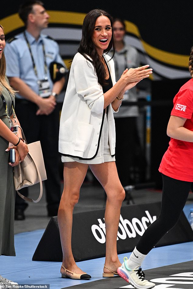 The Duchess of Sussex smiles during the Invictus Games at the Merkur Spiel-Arena today