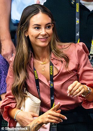 Beth Herlihy donned a smart pink blouse