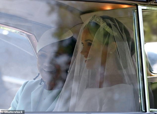 Doria Ragland and a veiled Duchess of Sussex on the way to St George's Chapel, Windsor in 2018