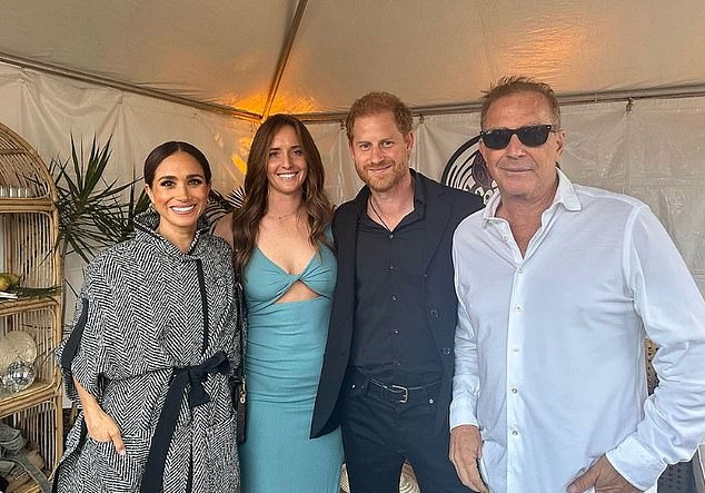 Meghan and Harry pictured backstage at the event with host and Hollywood star Kevin Costner