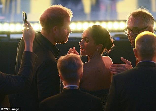 The father-of-two, 39, looked dapper in a smart black suit, which he paired with a matching black shirt