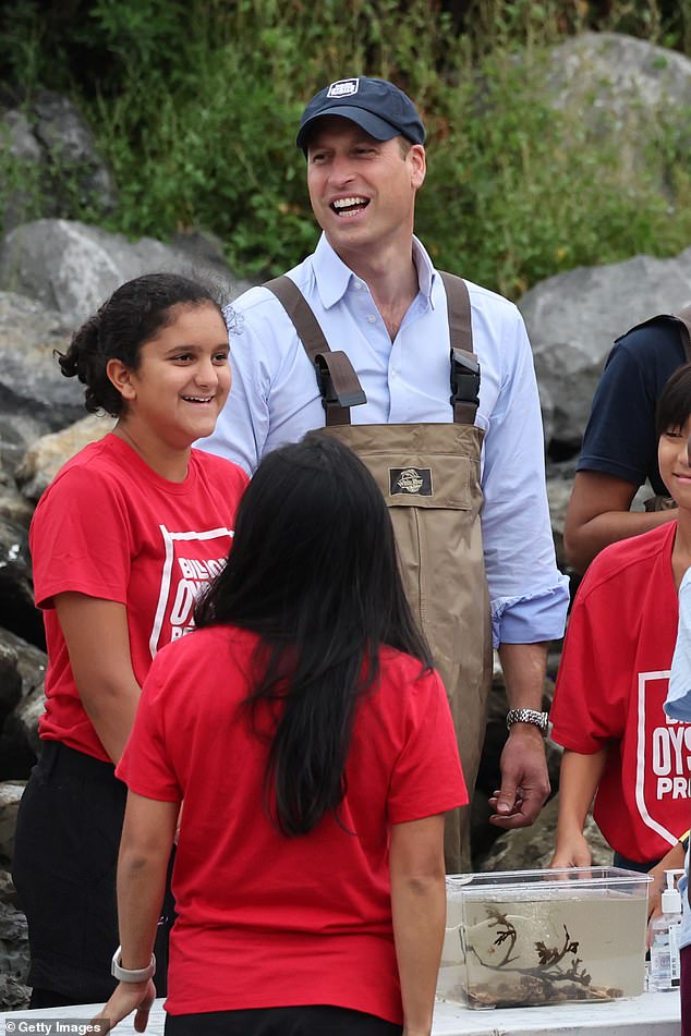 The Prince of Wales can be seen chuckling as he speaks with children as he visits Billion Oyster Project