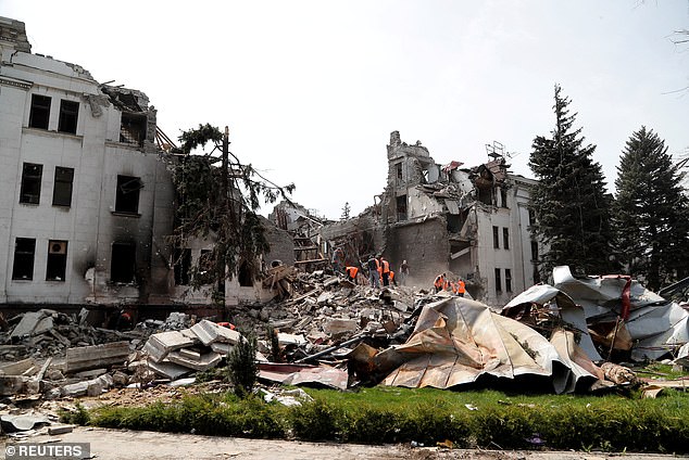 Volunteer paramedic Yulia Paievska, 53, was kidnapped by Russian soldiers in March while she was heading to treat injured members of public after a bomb attack on a theatre in Mariupol. Pictured: The destroyed theatre in Mariupol