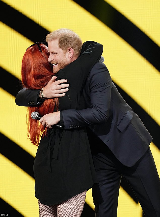 Harry embraced Anna-Sofia Puzanova, an Invictus athlete whose paramedic mother has been captured by Russian forces in Ukraine