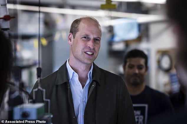 Britain's Prince William, Prince of Wales speaks to students from the Urban Assembly New York Harbor School about the Billion Oyster Project on Governors Island in New York on Monday, Sept. 18, 2023. (AP Photo/Stefan Jeremiah, Pool)