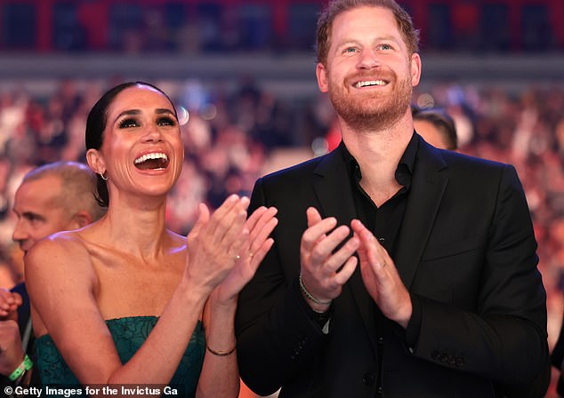 Meghan and Harry enjoying the closing ceremony at the Invictus Games in Dusseldorf