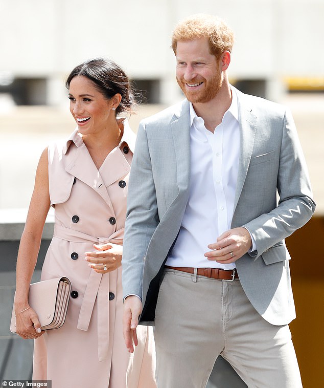 Harry has also re-used his clothes, evidenced by his love for the same £188 J Crew Ludlow jacket that he has worn on dozens of occasions. Above: Harry in the jacket with Meghan in 2018