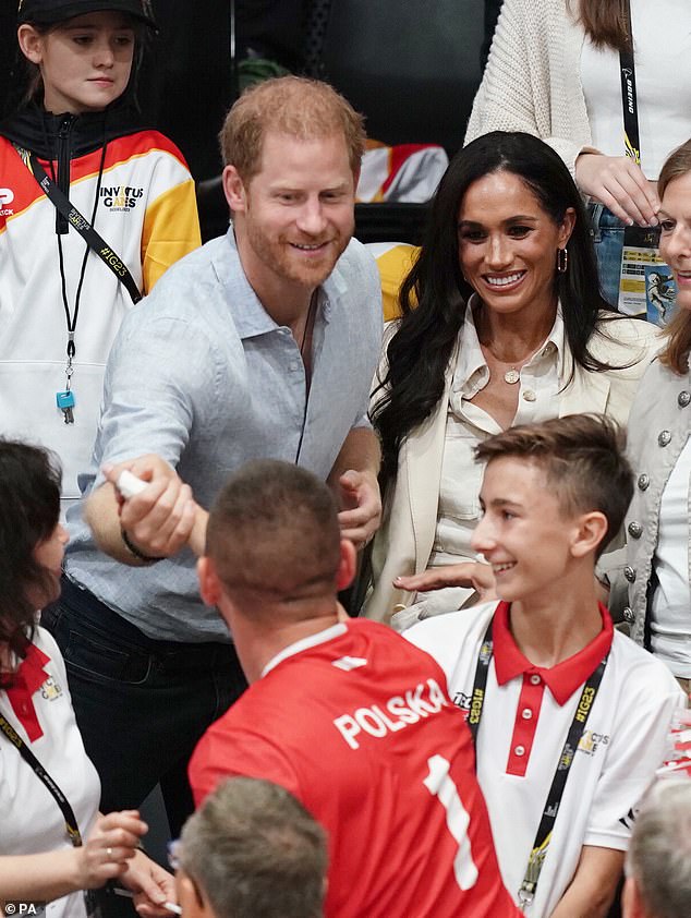 They also greeted fans and athletes, shaking hands with them at the game