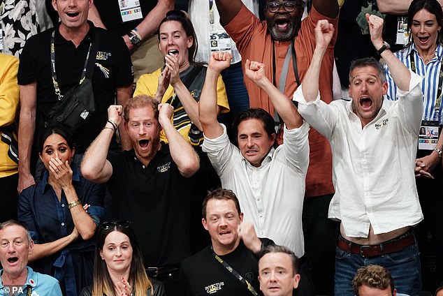 Stunned faces and arms swung in the air by the crowd during the volleyball final