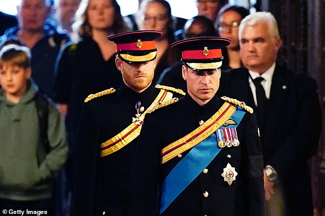 A clean shaven Prince William is followed by his younger and defiantly bearded brother on his wedding day