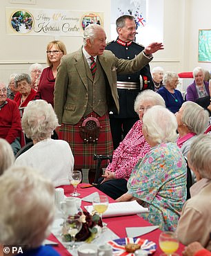 Charles was overheard to remark that he was impressed with the size of the leeks when he took a tour of the group's garden nearby where volunteers grow their own vegetables