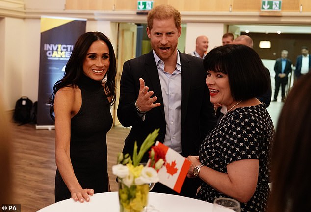 Harry kept the top buttons of his shirt undone, creating a more casual look for the meeting with Team Canada