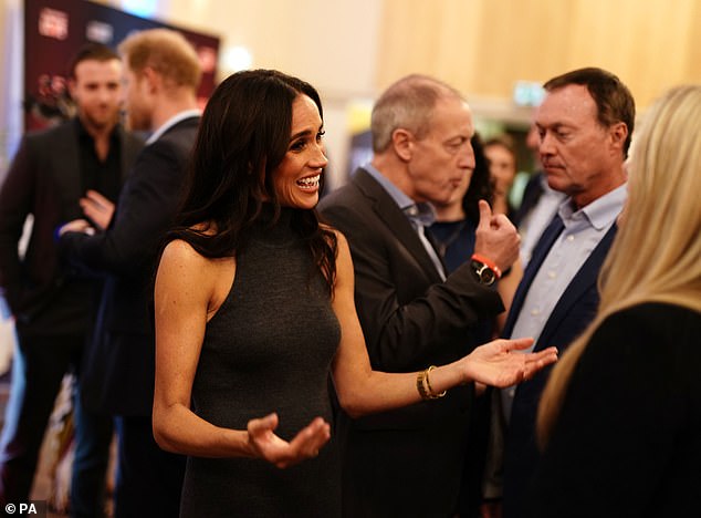 The Duchess has taken a formal form of greeting the attendees with a handshake- unlike yesterday where she bestowed plenty of warm hugs to those she met, despite it contradicting royal protocol