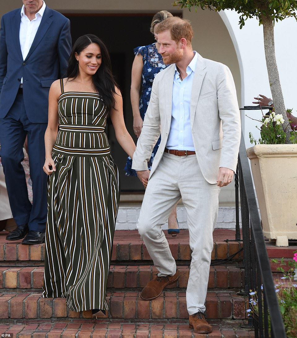 The Duke and Duchess of Sussex are pictured a reception at the British High Commissioner's Residence in Cape Town, South Africa, on September 24, 2019. This is where the heater began smoking in the nursery one day earlier, on September 23, 2019