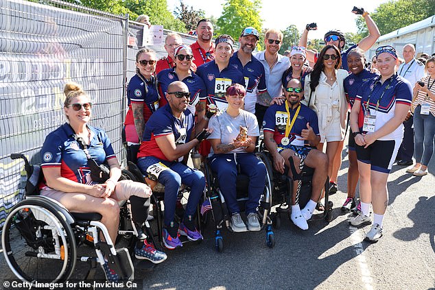 The couple were beaming as they lapped up the atmosphere at the Invictus Village earlier this afternoon