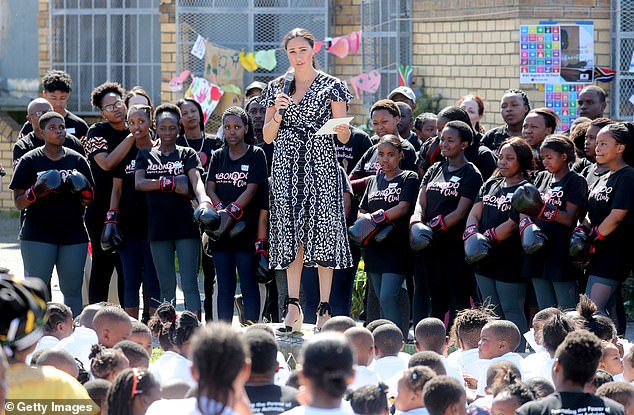 Meghan makes a speech as she visits a Justice Desk initiative in Nyanga township, with Prince Harry during their royal tour of South Africa on September 23, 2019. Just minutes later, she was told that her son's bedroom was on fire