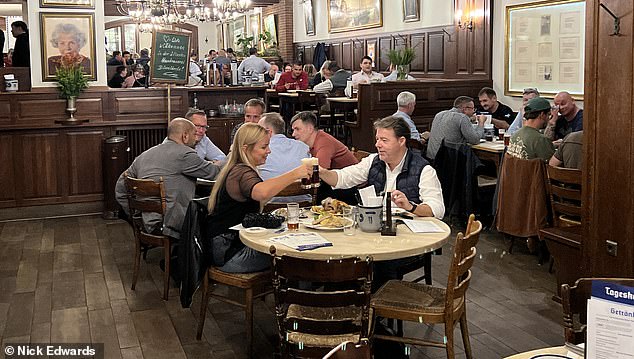 Staff at the restaurant said Meghan had one small beer. They were so thrilled to have Harry and Meghan that they shared photos with each other of the couple posing up. Pictured are diners at the restaurant