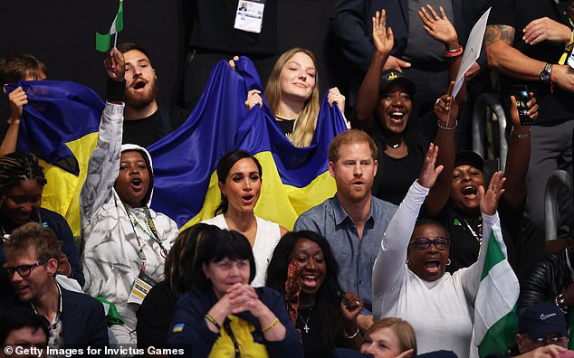 The couple appeared on the edge of their seats as they watched the game yesterday afternoon