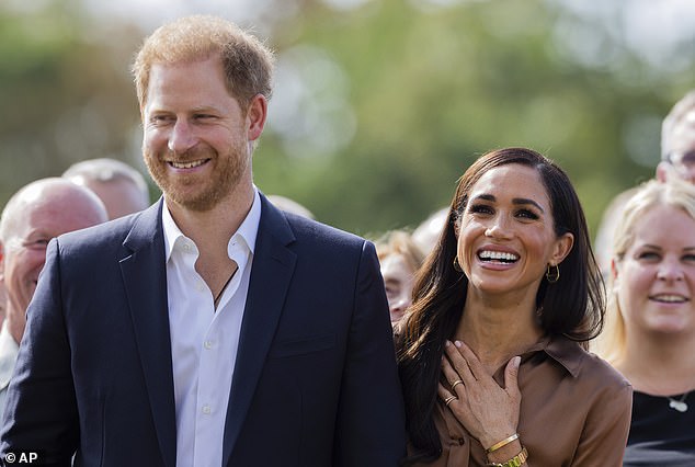 The mother of two, 42, wore $1,490 wide-leg silk trousers from Gabriel Hearst, which she previously wore to the One Young World roundtable in 2022