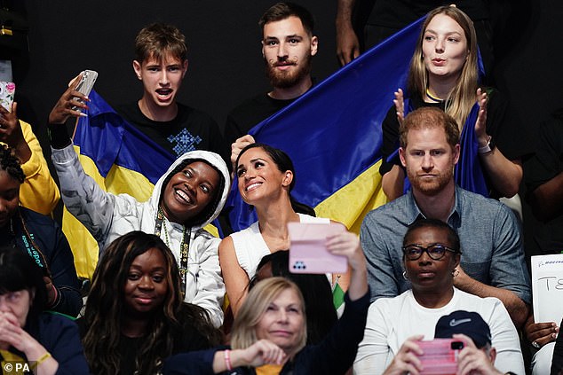 The beaming duchess took selfies with others  at the Mekur Spiel-Arena in Dusseldorf