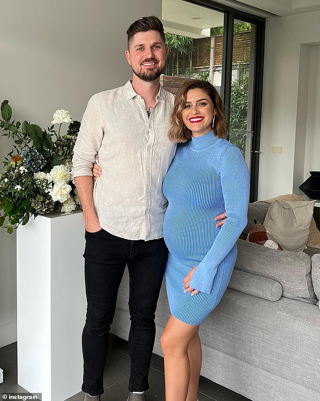 Natasha and Brad, who got engaged in December 2020 after four years of dating, announced they were expecting their first child together in January. (Pictured in April)