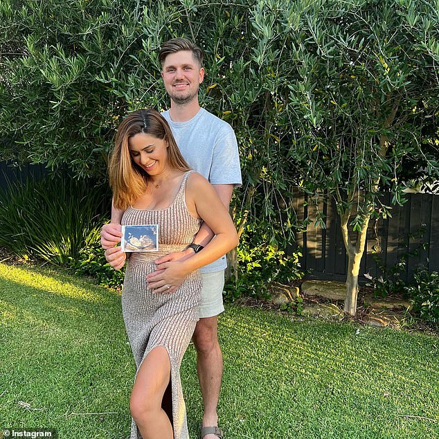 Natasha is seen here at 17 weeks pregnant when she and Brad announced their baby news