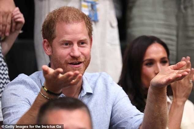 Harry reacts while attending the sitting volleyball match at the Merkur Spiel-Arena today