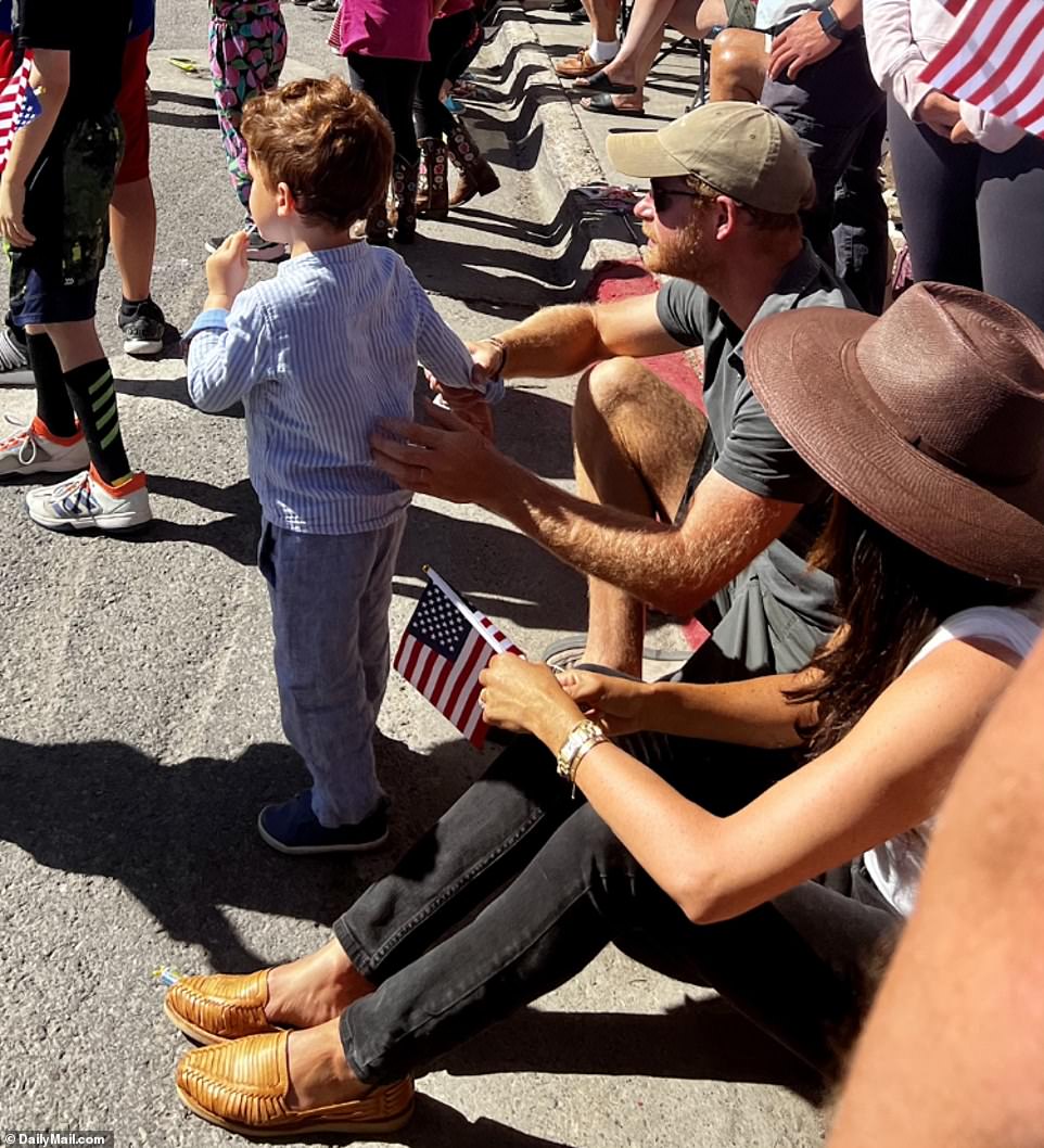 Megan paired skinny jeans and a white tank top with a brown fedora hat while Harry wore a blue-grey polo shirt, shorts and an olive baseball cap. Dorak, who spoke out in the Duchess's defense in the wake of her tell-all Oprah Winfrey interview, wore a camel jumpsuit.