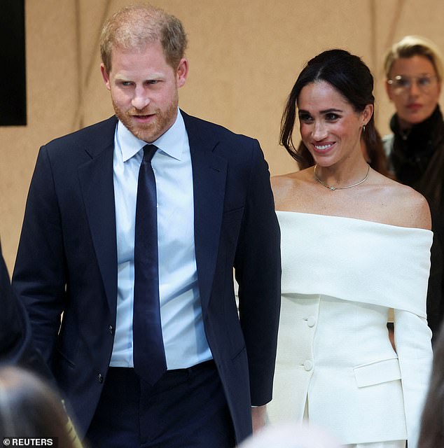 Meghan, 42, was seen sporting a glamorous white strapless pant suit as she arrived at the Hudson Yards venue for the summit, which will see the couple discussing social media dangers