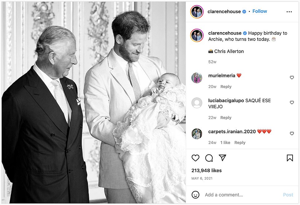 Prince Charles' more informal message reads: 'Happy birthday Archie', accompanied by a heart emoji. The accompanying black and white photograph shows Harry gazing down at Archie in his Christening robes while proud grandfather Prince Charles looks on, smiling.