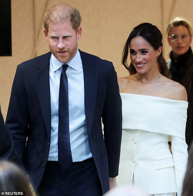 Meghan, 42, was seen sporting a glamorous white strapless pant suit as she arrived at the Hudson Yards venue for the summit, which will see the couple discussing social media dangers