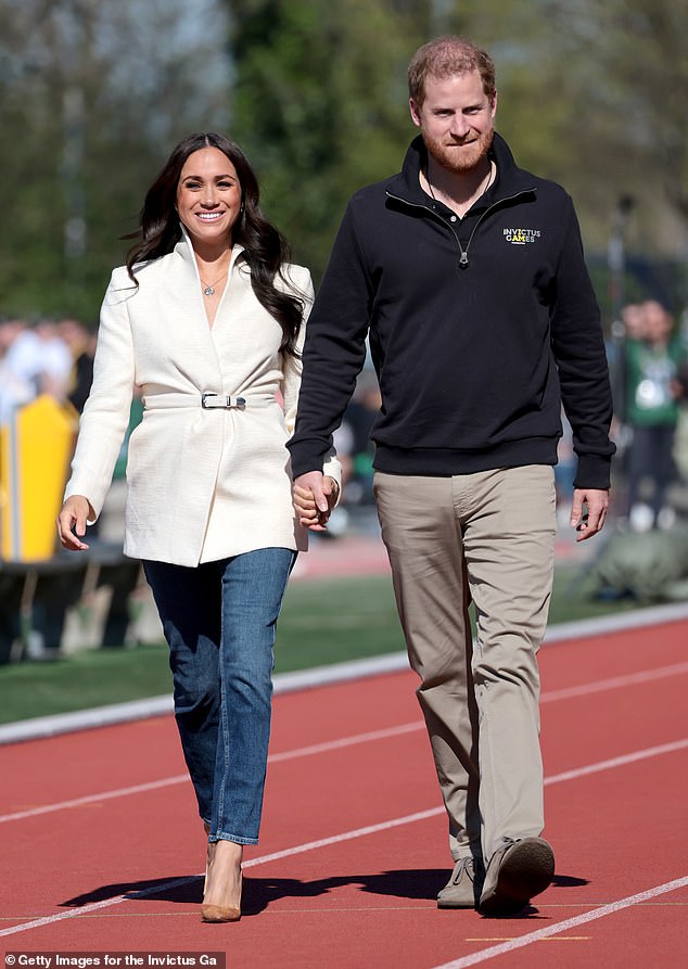 Harry, 37, and Meghan, 40, could join the Queen and senior royals on the balcony following Trooping the Colour but it would be in an informal role, following their decision to step down as working members of the Royal Family. Pictured, the Sussexes in The Hague over the weekend