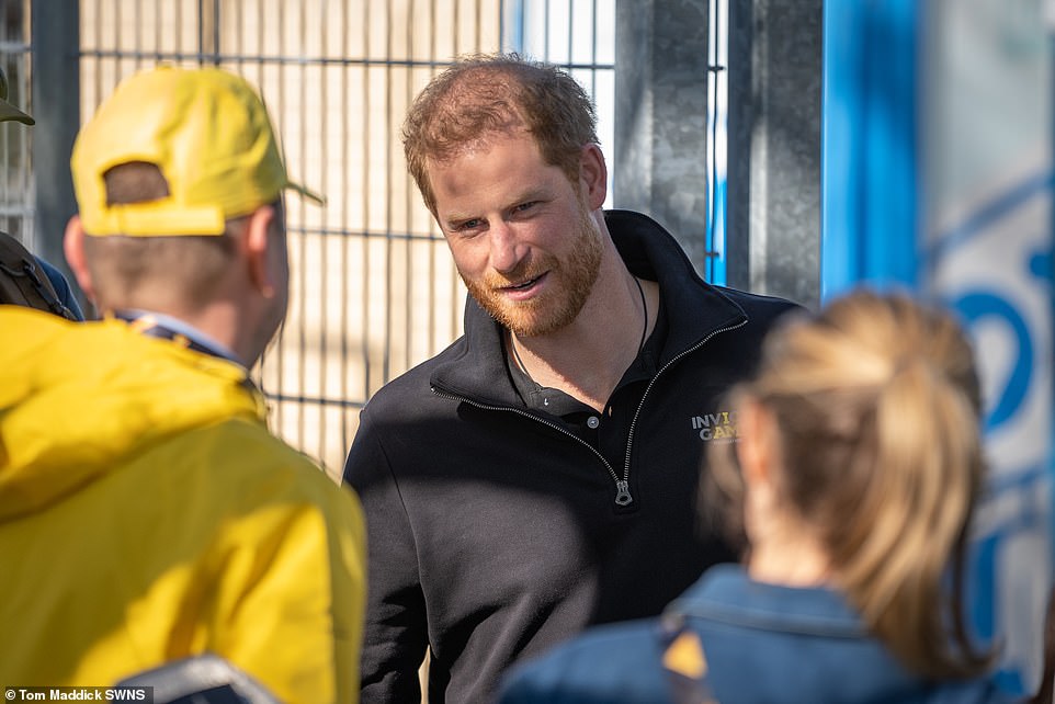 On Sunday morning as they arrived at the athletics track, the couple chatted briefly to staff assembled at the entrance as the guards looked on