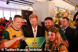 The Duke of Sussex laughed as athletes representing Team Australia presented him with a pair of swim briefs, as shown in photos from the reception shared by Aussie Invictus on Twitter