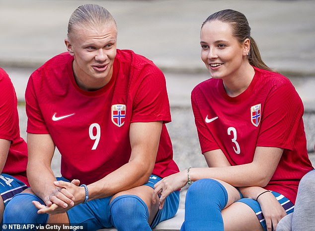 She was moved to a private international school in Oslo so she could become fluent in English. Pictured with Manchester City's Norwegian star  Erling Haaland for a friendly game