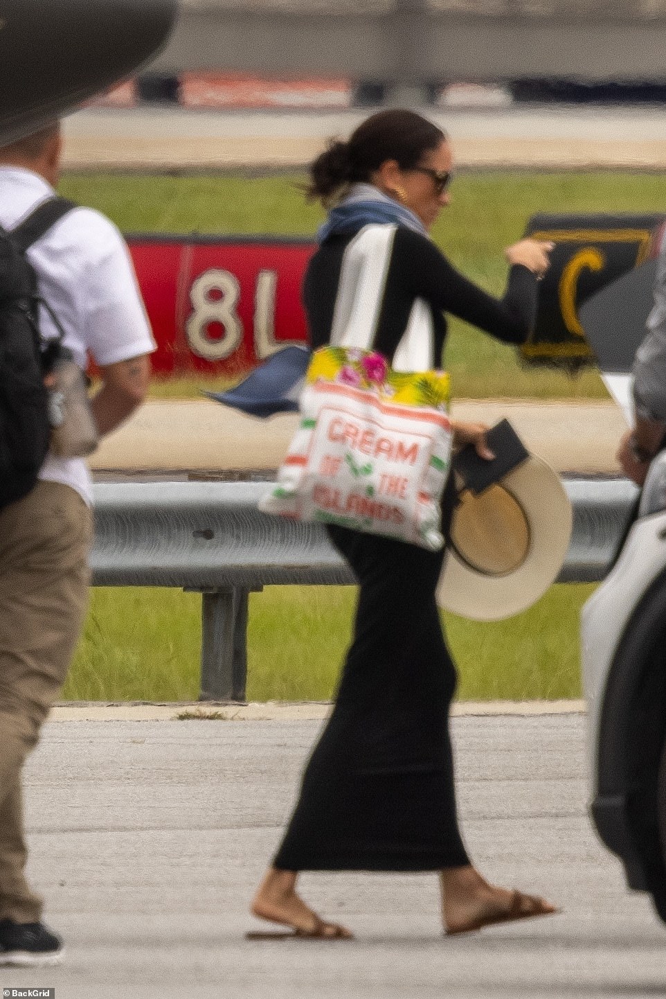 Meghan Markle leaves the tarmac after landing in Atlanta on Monday