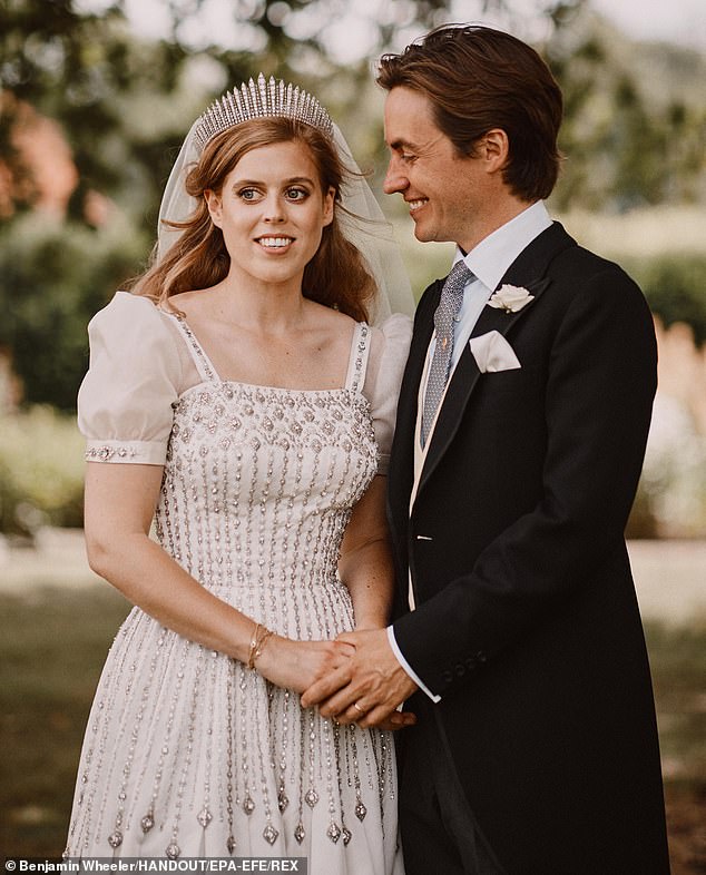 On her wedding day, Beatrice stunned in a vintage dress by Norman Hartnell, on loan from her late grandmother, Queen Elizabeth II