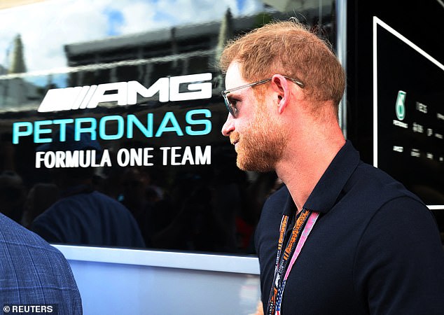 Prince Harry pictured ahead of the race looking cool in his shades. He was pictured alone without Meghan Markle