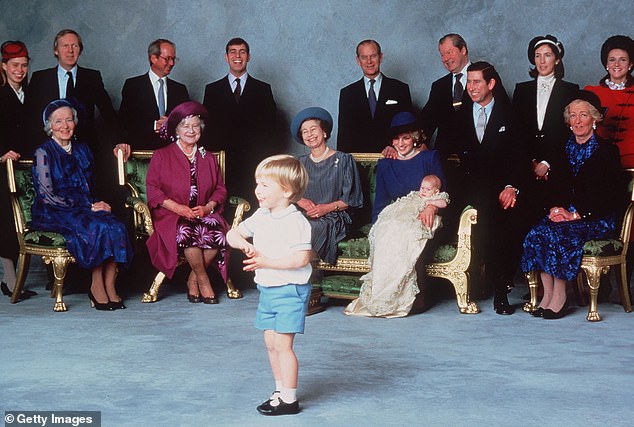 Royal relatives and godparents gather on Prince Harry's christening day at Windsor Castle on December 21, 1984. A young Prince William is attracting attention in the foreground. Princess Anne is nowhere to be seen