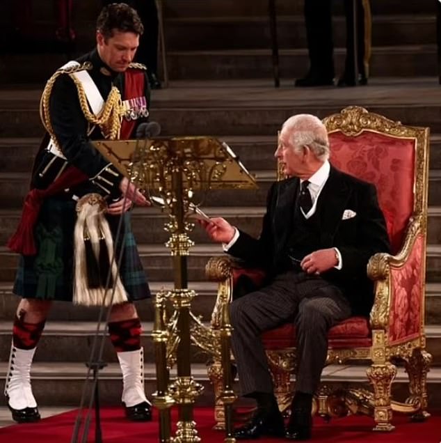 King Charles has promoted Lt Col Johnny Thompson to a 'super equerry', making him now the monarch's right-hand man. Thompson is pictured during the King's Coronation in May