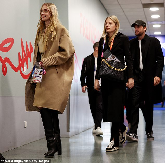 Outing: Just hours after the kiss, Sophie was seen smiling as she and Peregrine both arrived ahead of the Rugby World Cup Final match between New Zealand and South Africa