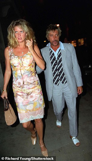 Pictured: Rod Stewart with his then wife Rachel Hunter in 1997 at Tramp