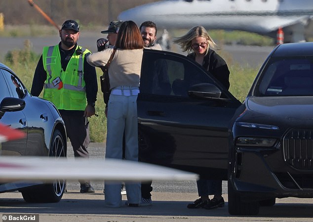 Everyone exchanged hugs as they got ready to board the jet