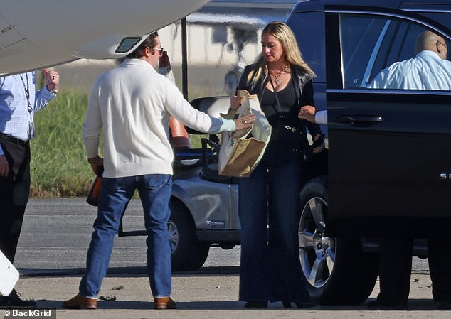 The power couples all gathered at the airport ahead of their quick journey to Las Vegas